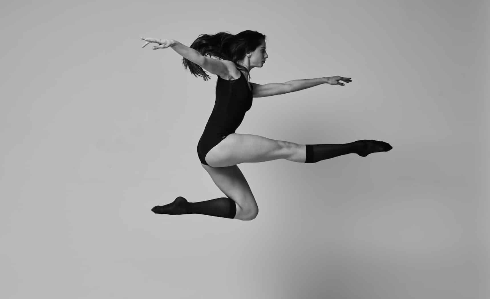 dancer black and whit wearing compression socks