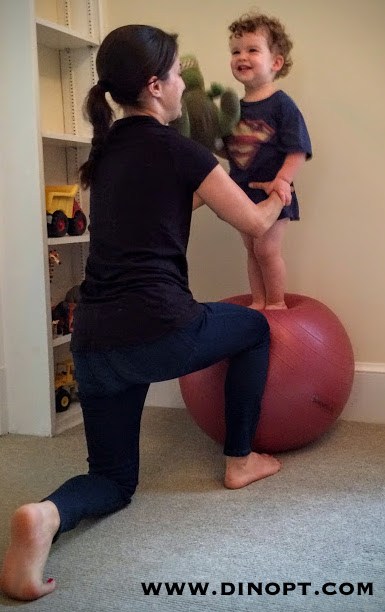 kid on pilates ball